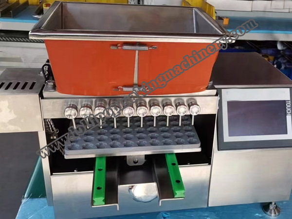 Automatic small scale lollipop making machine